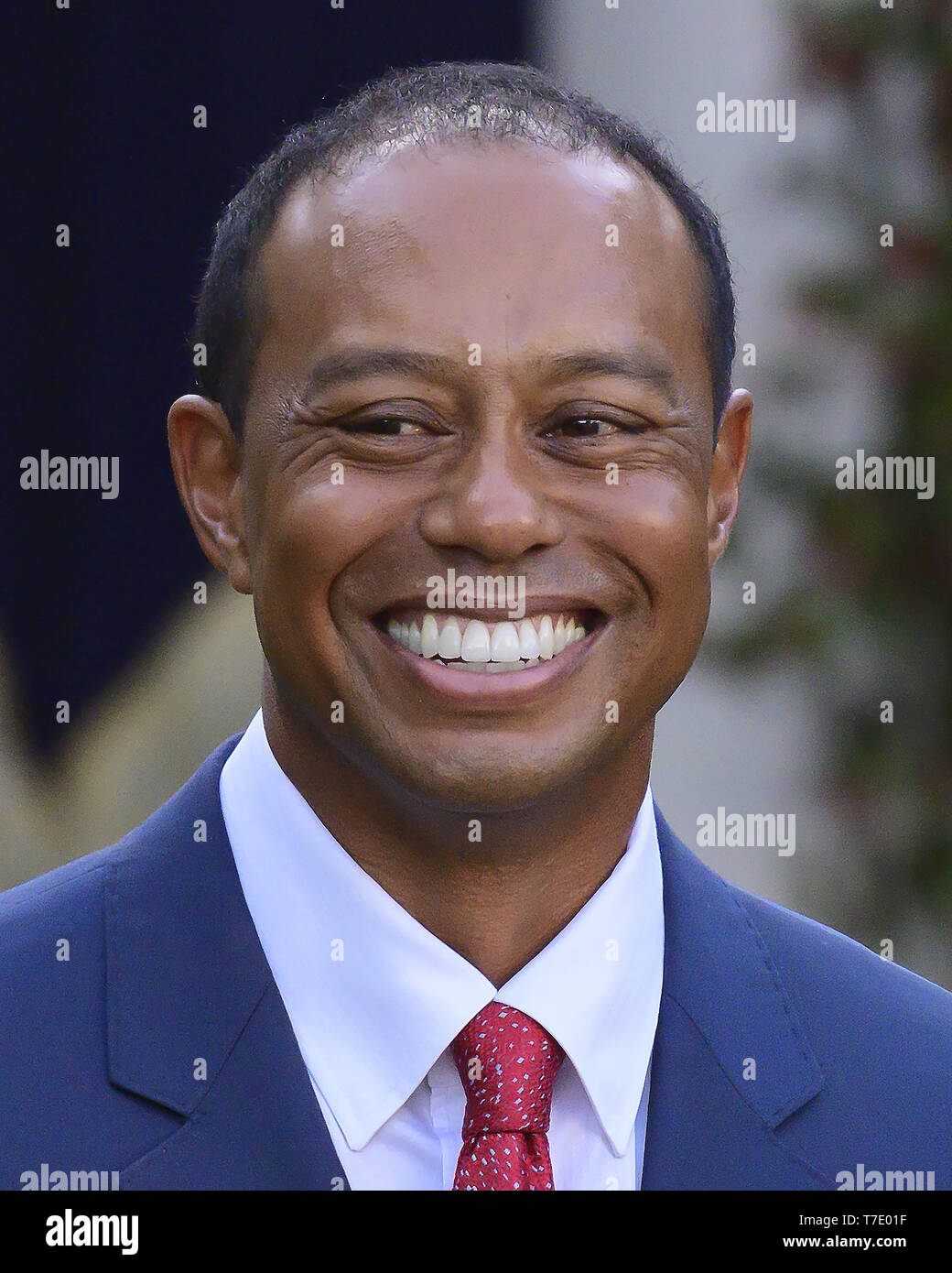 May 6, 2019 - Washington, District of Columbia, U.S. - Professional golfer Tiger Woods listens as United States President Donald J. Trump makes remarks presenting him the Presidential Medal of Freedom during a ceremony in the Rose Garden of the White House in Washington, DC on May 6, 2019. The Presidential Medal of Freedom is an award bestowed by the President of the United States to recognize those people who have made ''an especially meritorious contribution to the security or national interests of the United States, world peace, cultural or other significant public or private endeavor.''.C Stock Photo