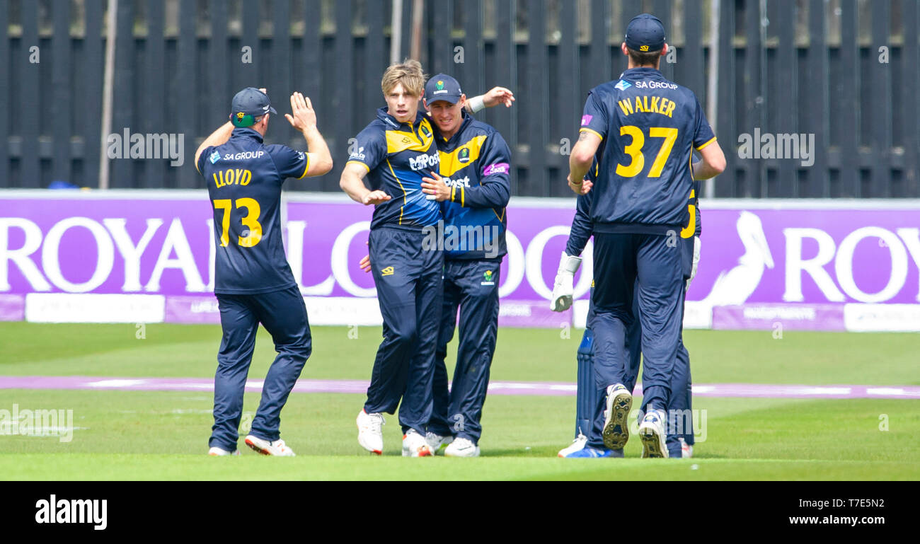 Brighton, UK. 7th May 2019 - Glamorgan celebrate taking the wicket of George Garton during the Royal London One-Day Cup match between Sussex Sharks and Glamorgan at the 1st Central County ground in Hove. Credit : Simon Dack / Alamy Live News Stock Photo
