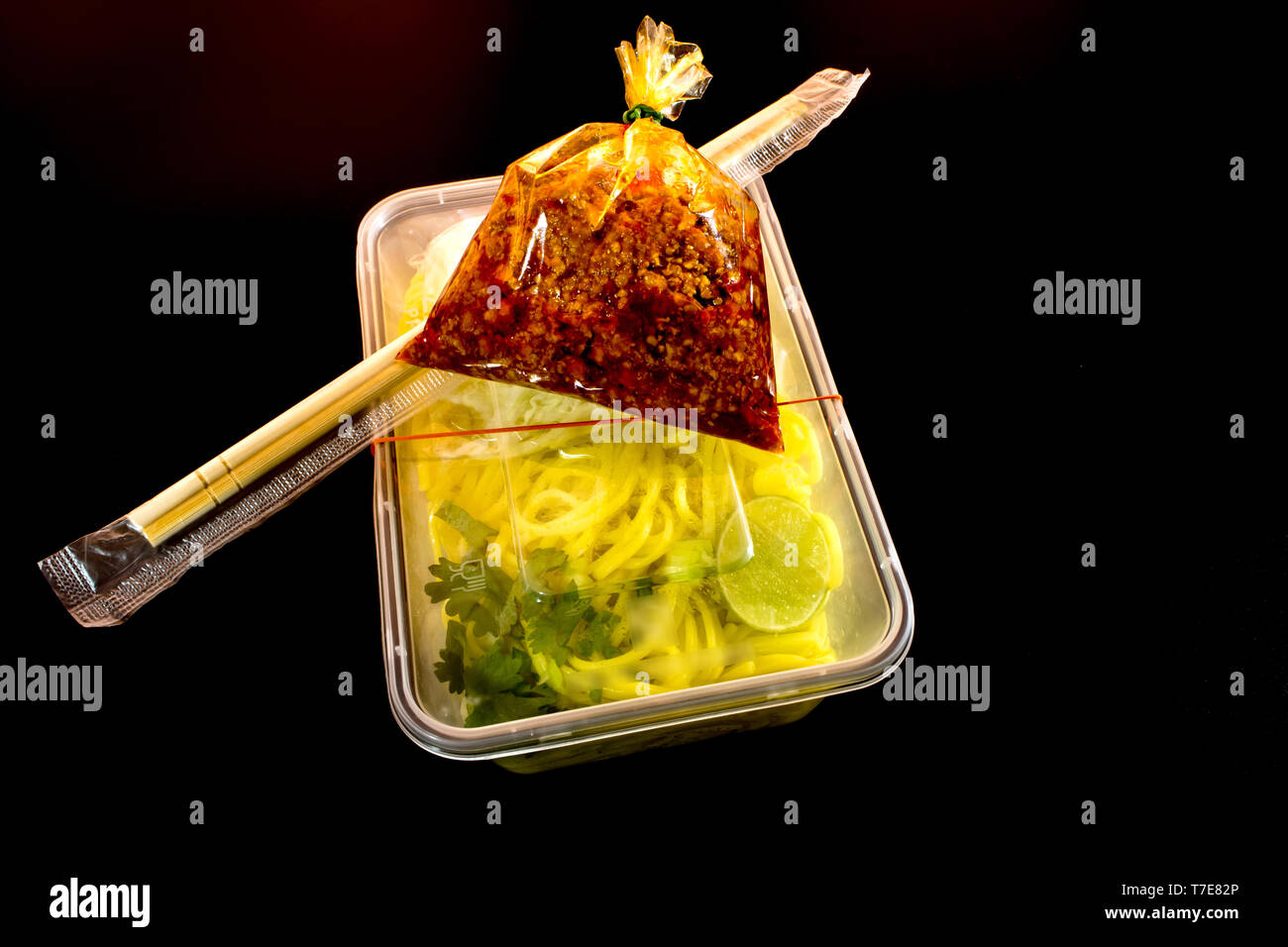 Spaghetti with sauce Take home food in plastic packaging Stock Photo