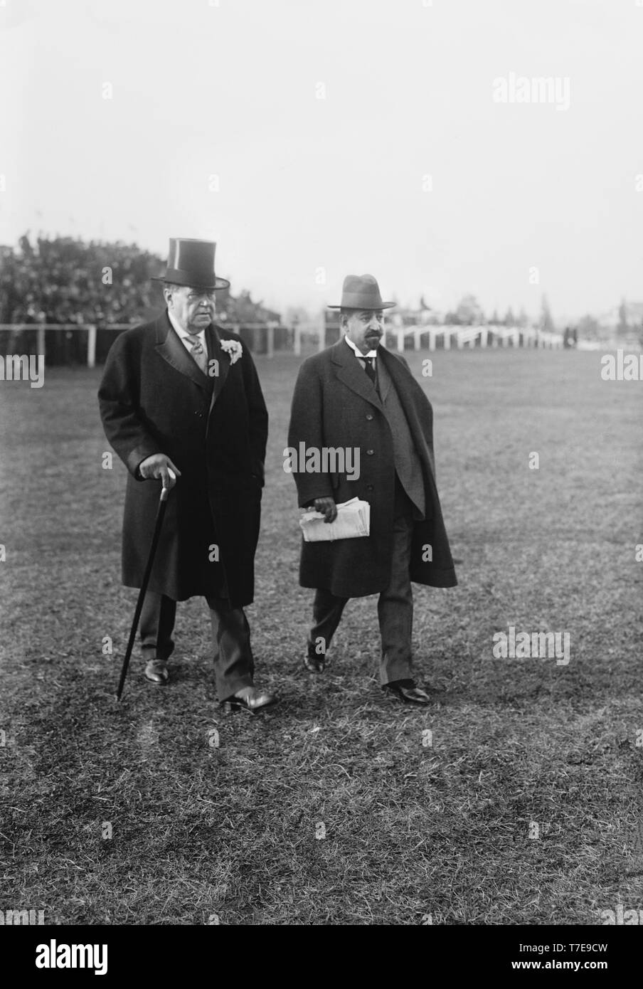 James Buchanan 'Diamond Jim' Brady and Unidentified Man at Opening Event of Racing Season, Bain News Service, 1916 Stock Photo