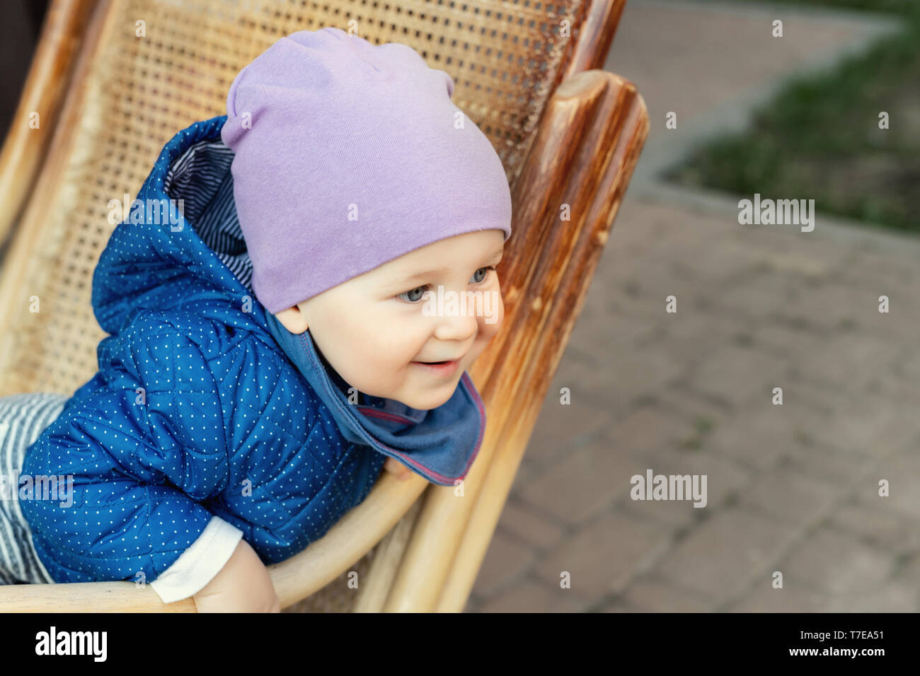 Portrait of cute adorable caucasian baby boy having fun sitting in