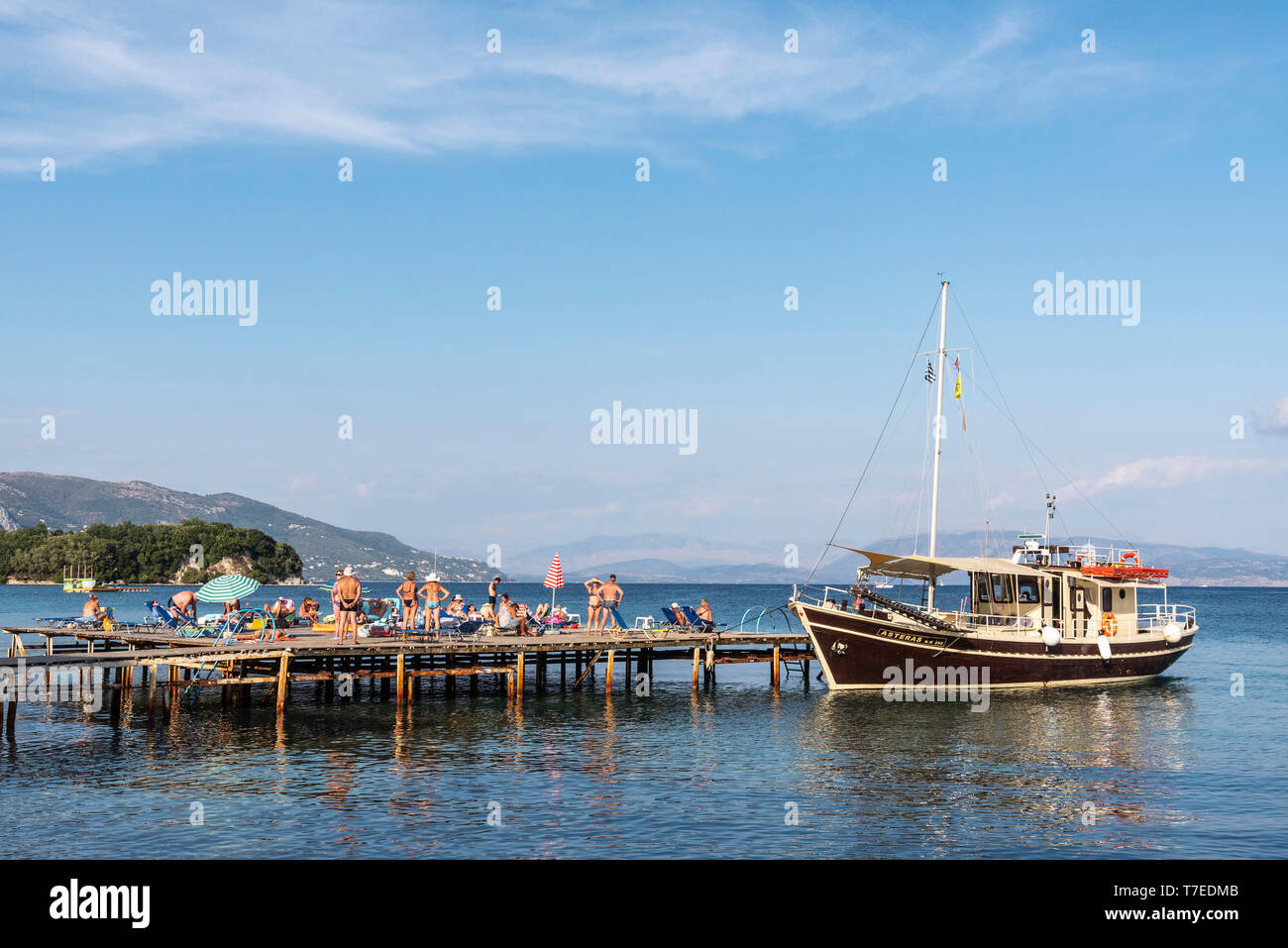 landing stage, bathing jetty, excursion boat, Dassia, Corfu Island, Ionian Islands, Mediterranean Sea, Greece Stock Photo