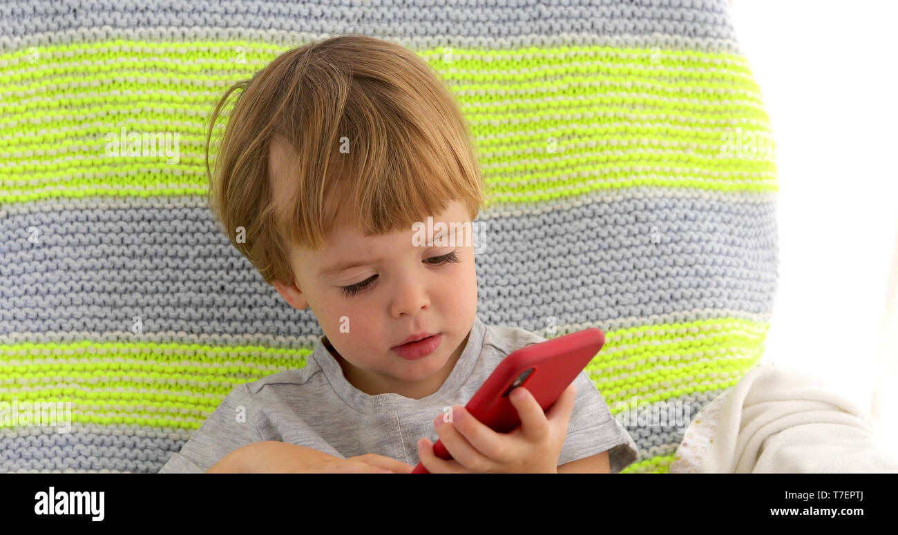 child swipe smartphone Stock Photo