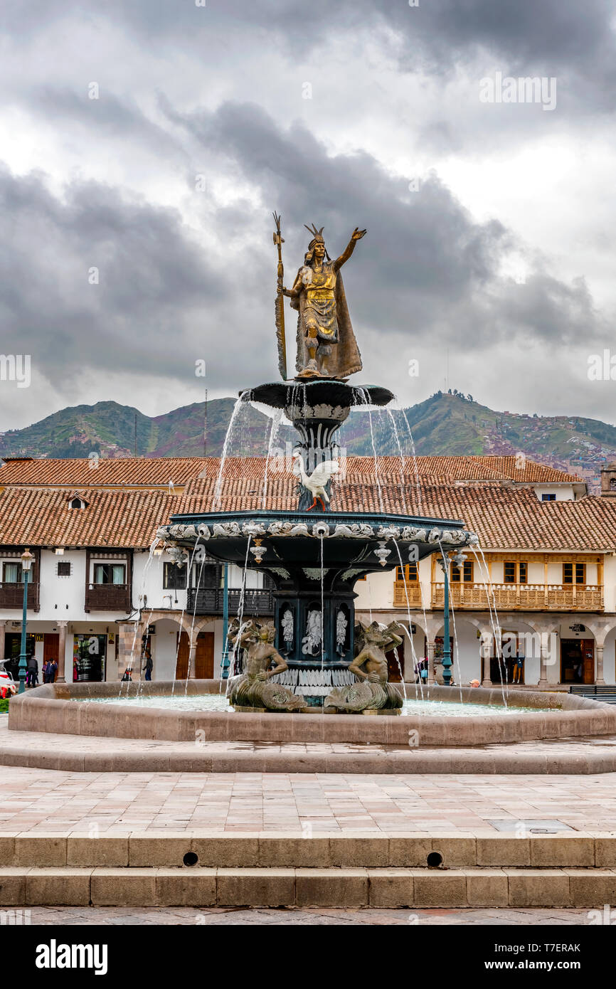 Cusco, Peru April 4, 2019 People visiting fountain statue of