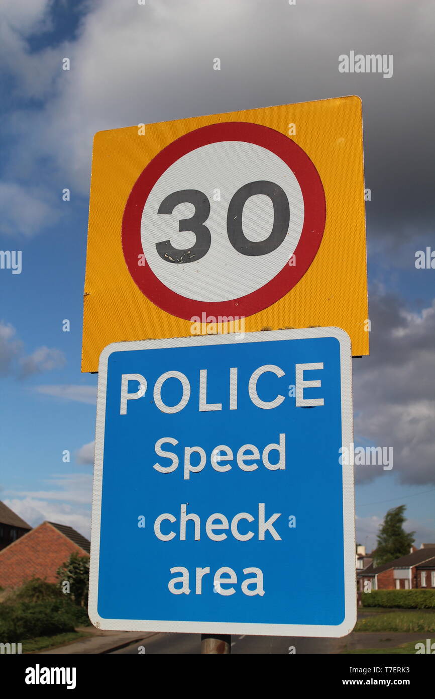 Road sign restricted speed limit 30 mph with police speed check area