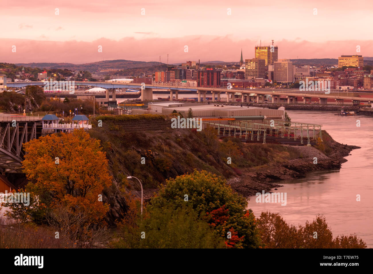 The Saint John skyline and the Saint John River at sunset in Saint John, New Brunswick, Canada. Stock Photo