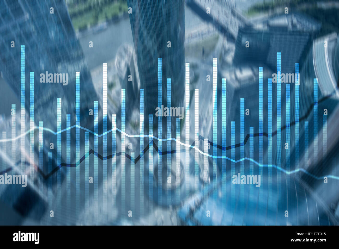 Double exposure Economics growth diagrams on blurred background. Business and investment concept Stock Photo