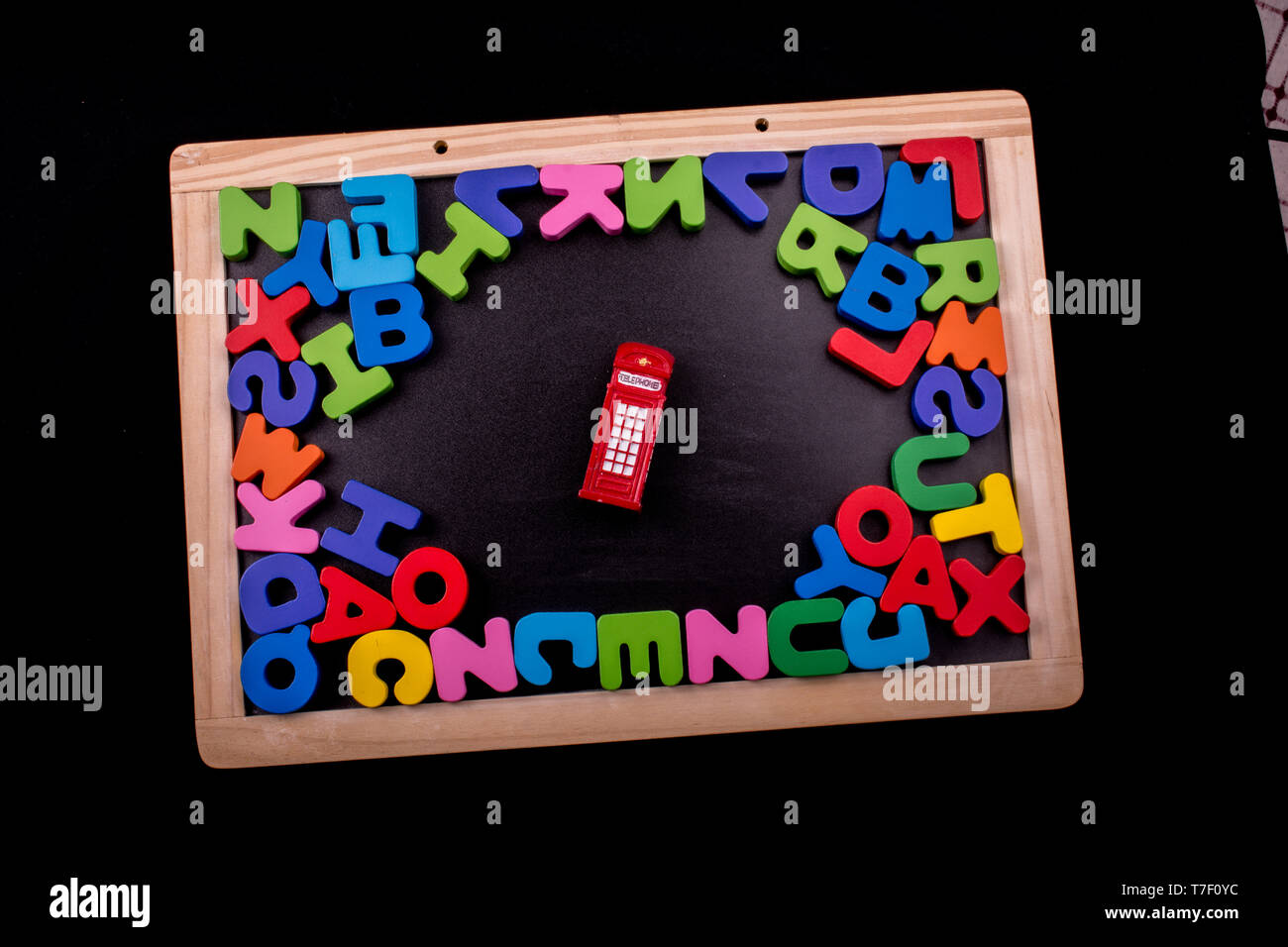 Telephone booth and colorful letters of Alphabet made of wood Stock ...