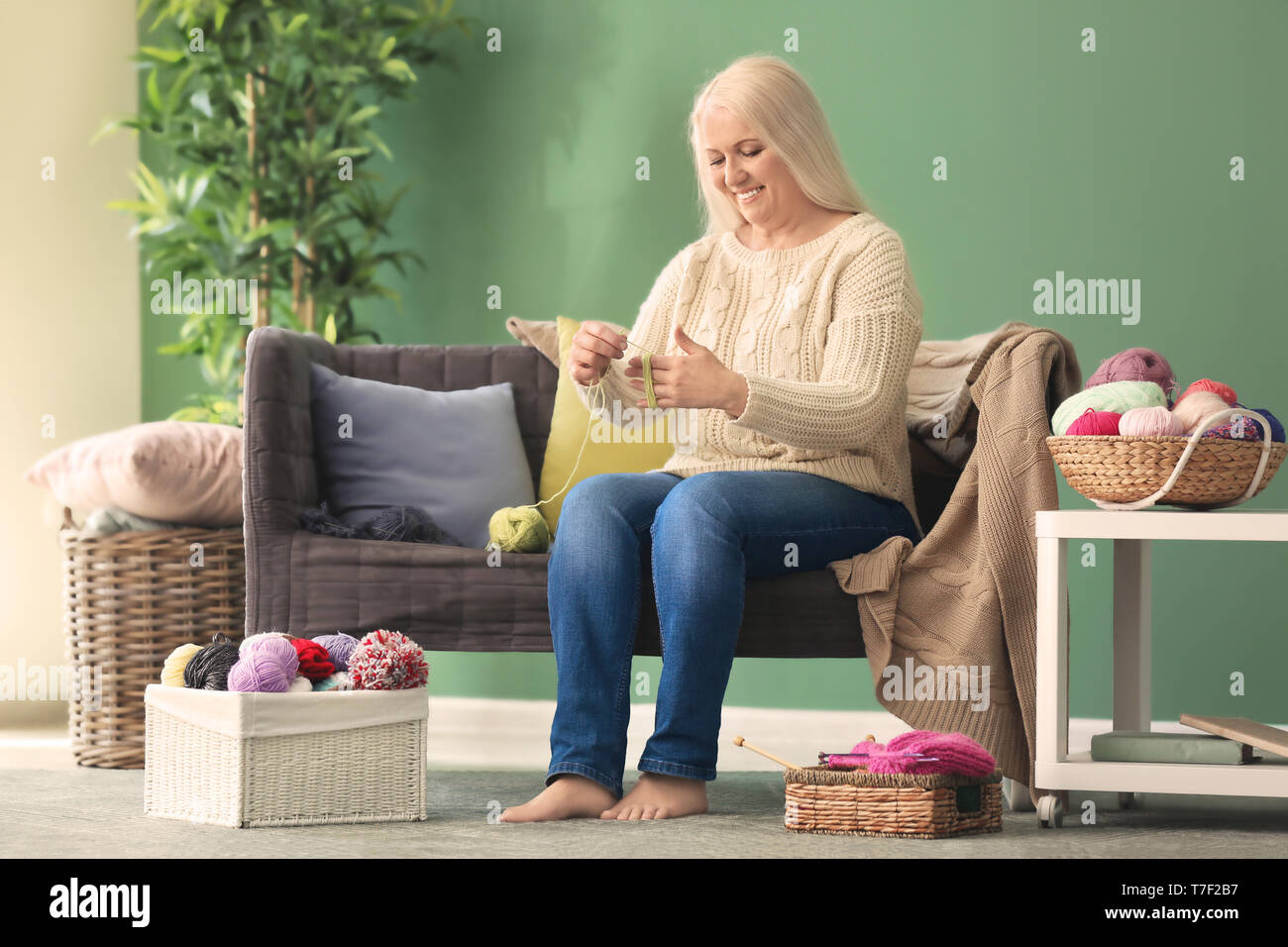 Wool sweater wool sofa woman hi-res stock photography and images - Alamy