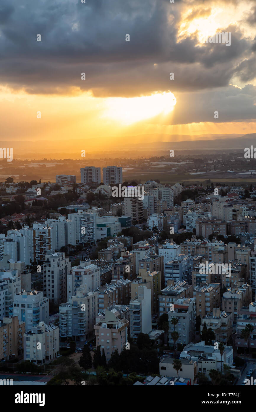 Aerial view of a residential neighborhood in a city during a cloudy