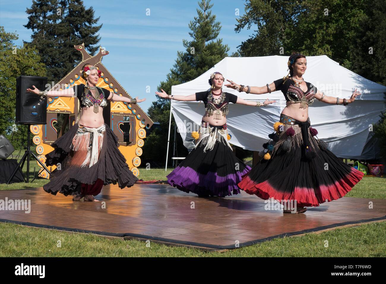 Belly dancers perform at the Maslenitsa Multicultural Festival in Eugene, Oregon, USA. Stock Photo