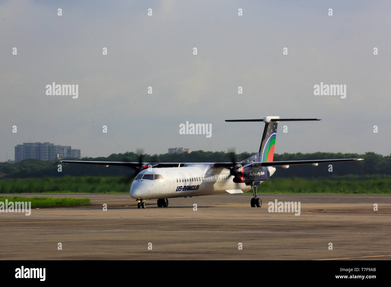 An US Bangla Airlines Bombardier Dash 8Q 400 aircraft on the runway at Hazrat Shahjalal Hazrat Shahjalal International Airport in Dhaka, Bangladesh. Stock Photo