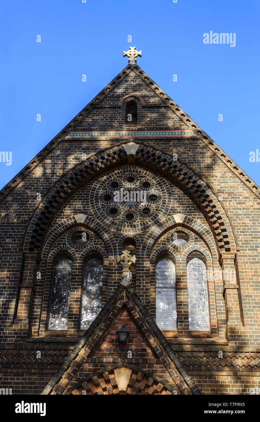 Detail of the central window of Anglican Cathedral of St Peter Apostle and Martyr, built from brick and completed in 1875 in Gothic architectural styl Stock Photo