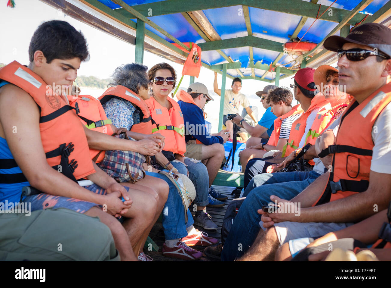 Wearing an orange life vest hi-res stock photography and images - Alamy