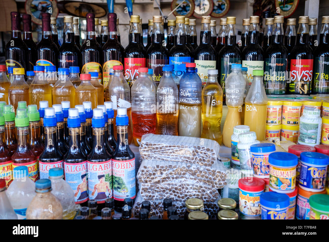 Popular medicine drinks like Boa or Lagarto (lisard) potions at Mercado Modelo in Puerto Maldonado, Amazon Basin, Peru Stock Photo