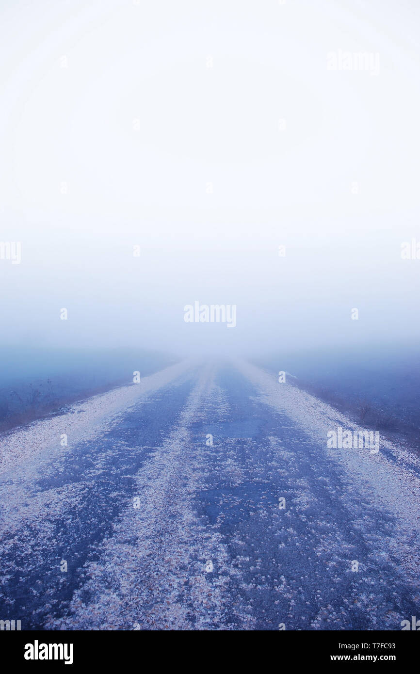 Dark foggy country road hi-res stock photography and images - Alamy