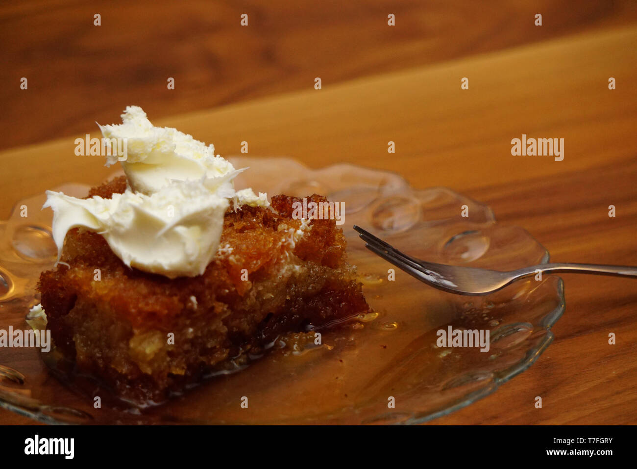 Crumpets in thick syrup Turkish dessert ekmek kadayifi Stock Photo Alamy