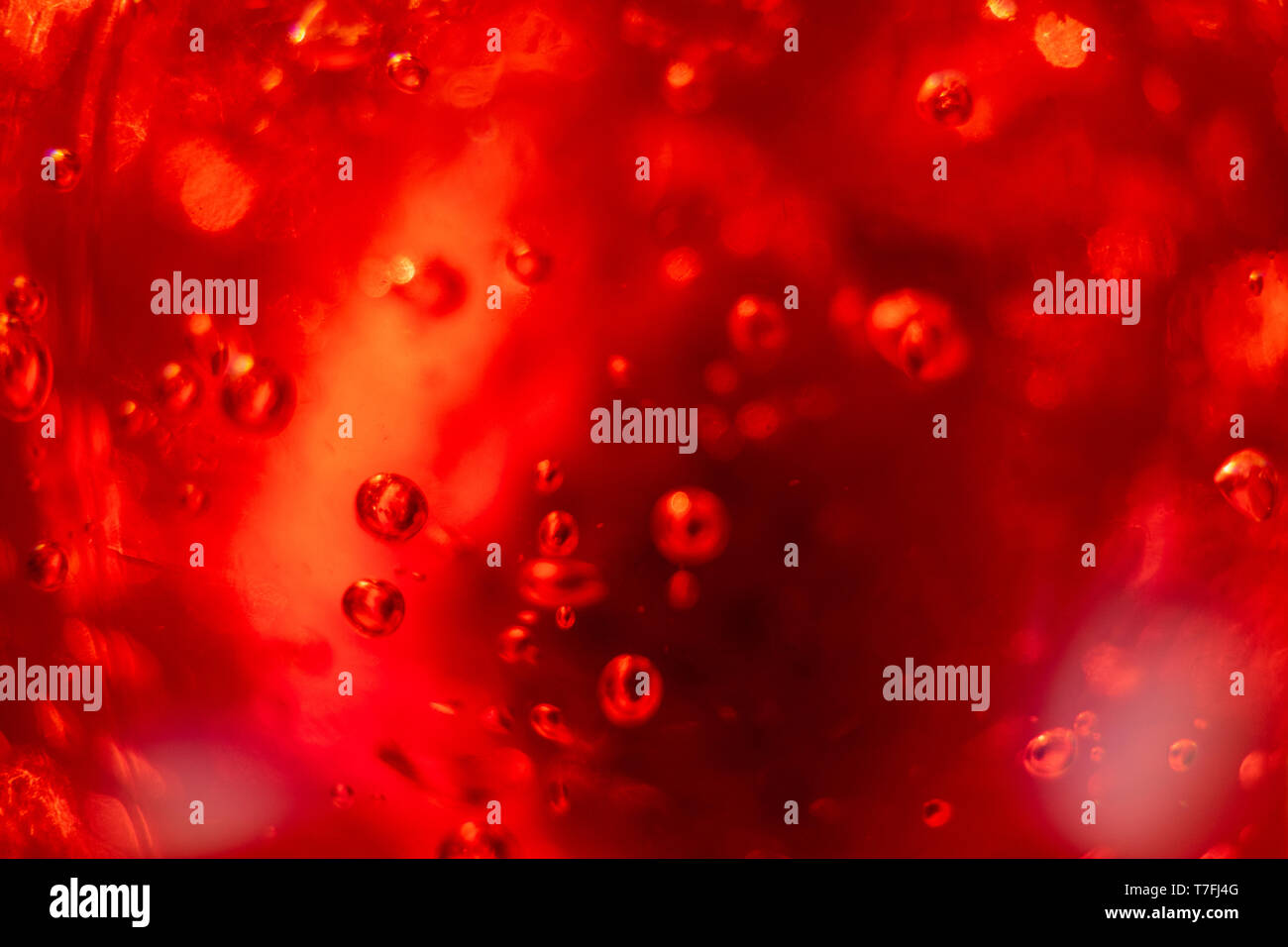 Background with strawberry in red jelly. Perfect for background. Around