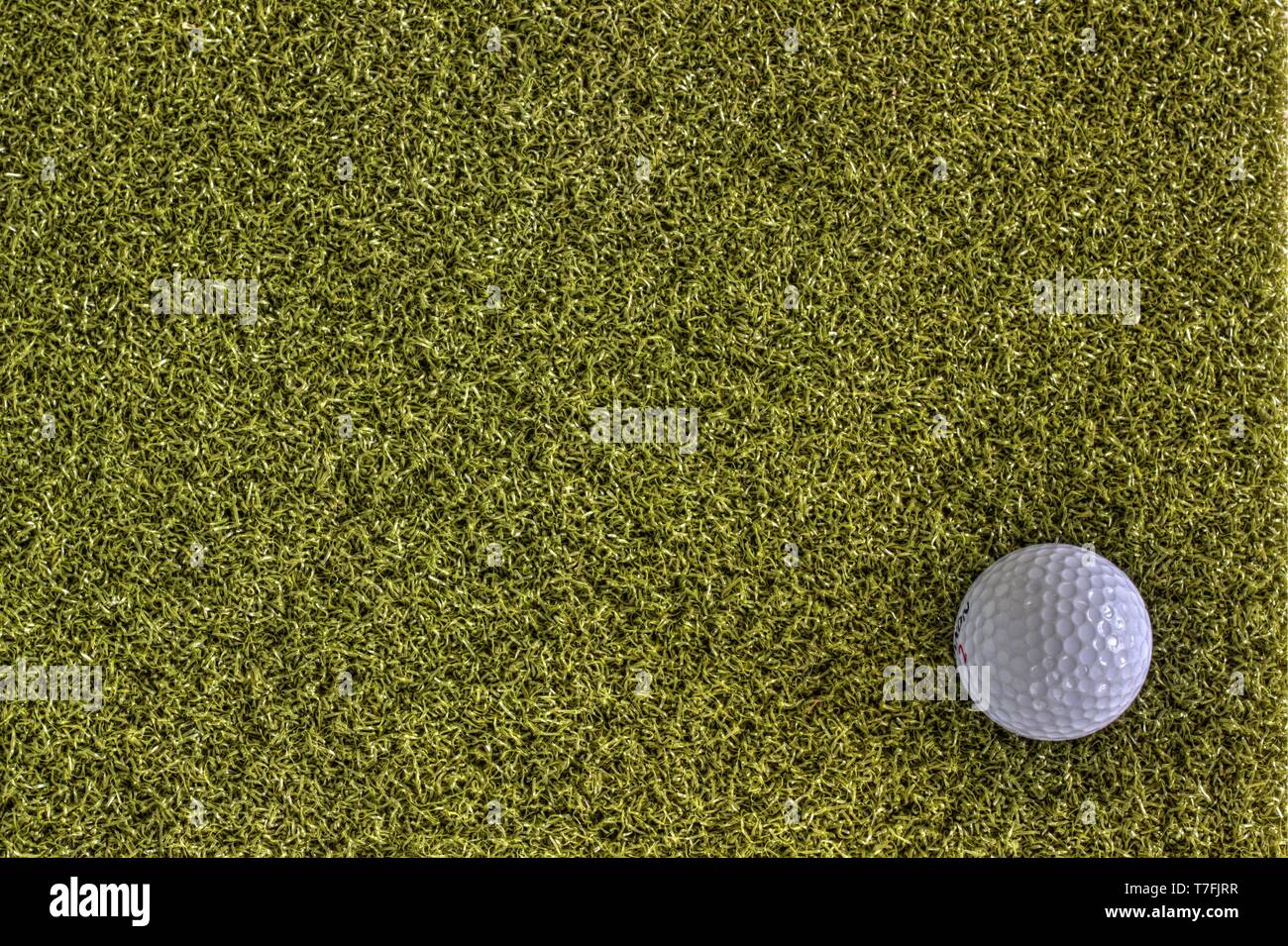 Golf ball on green Stock Photo Alamy