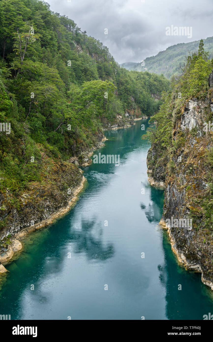 An amazing landscape at north Chilean Patagonia, Puelo river moves around the narrow gorge with its turquoise waters on an awe idyllic  environment Stock Photo