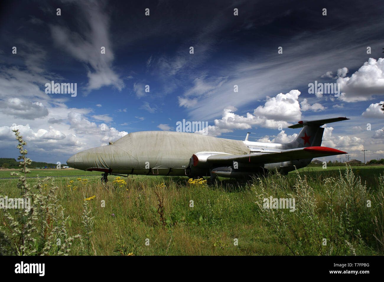 old aircraft on overgrown runway, Breighton Aerodrome Stock Photo