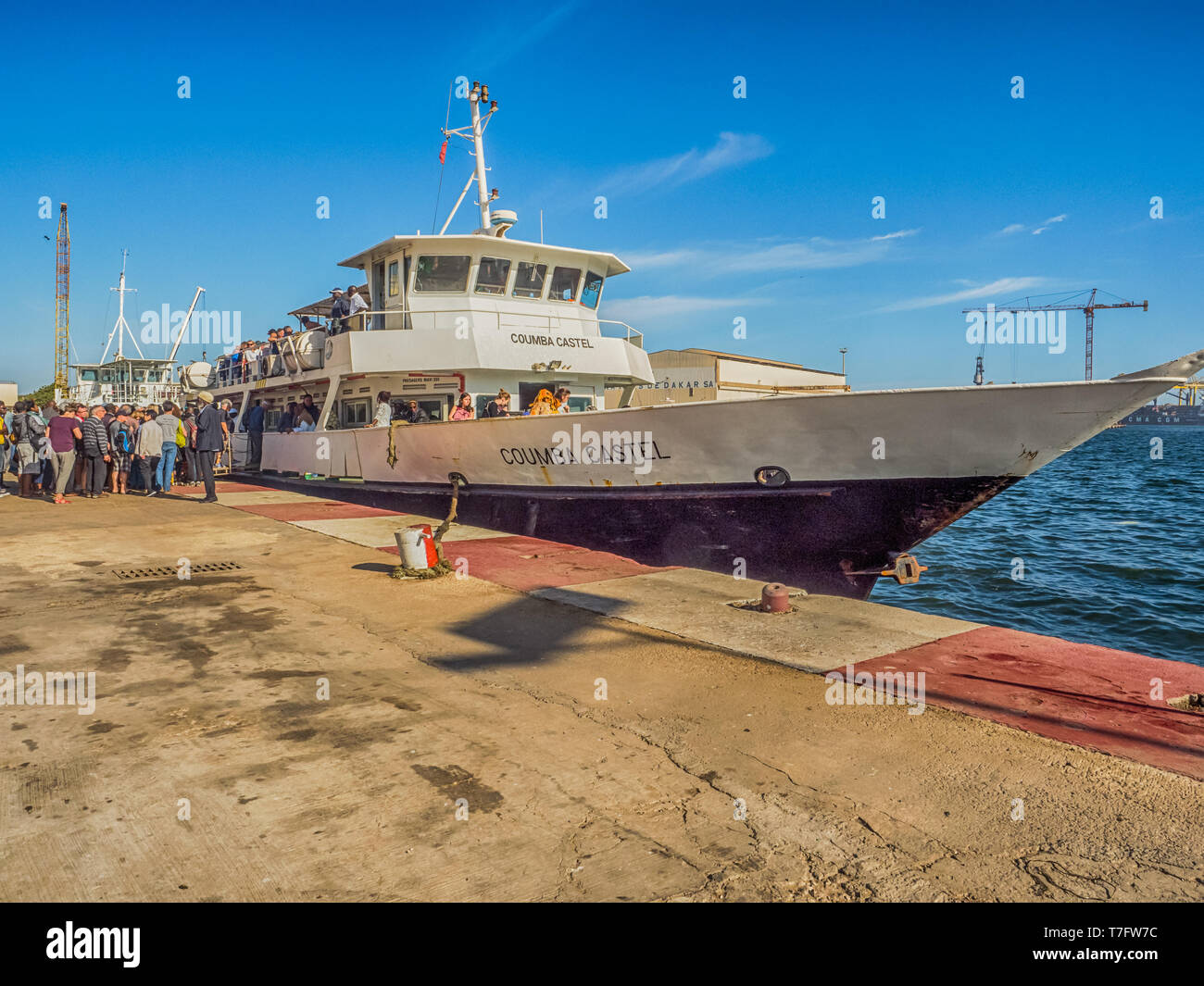 Dakar, Senegal - February 2, 2019: People waiting for the boat transporting people from Dakar to Goree island in port in Dakar. Gorée. Dakar, Senegal. Stock Photo