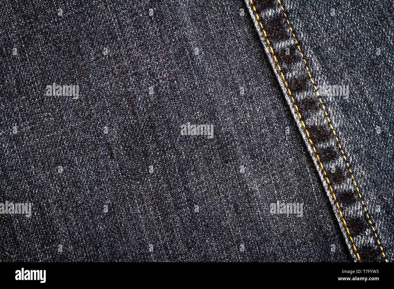 Black jeans texture. Denim jeans fabric background with a seam Stock ...
