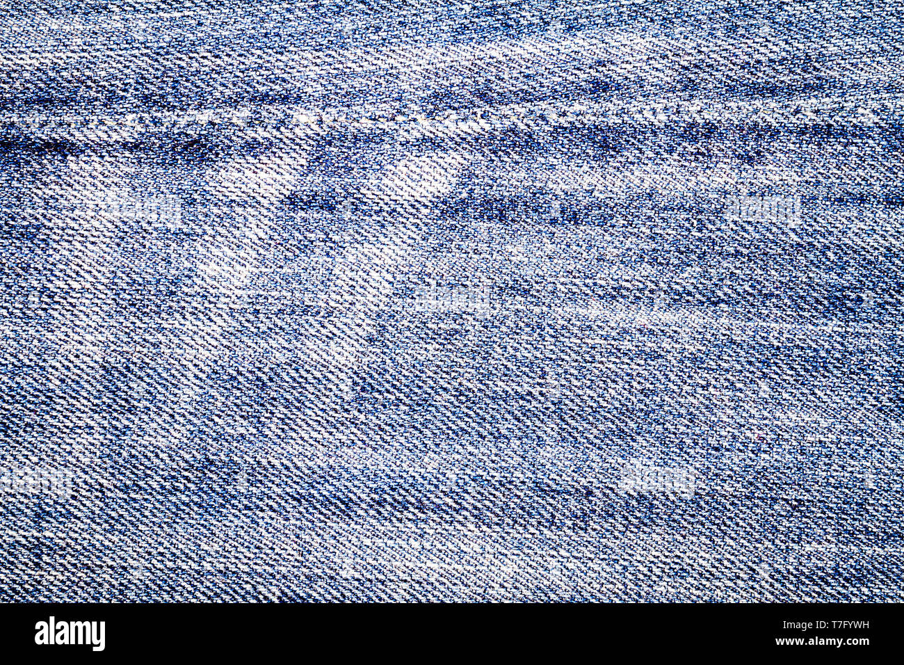 Light blue jeans texture. Denim fabric background with a seam Stock ...