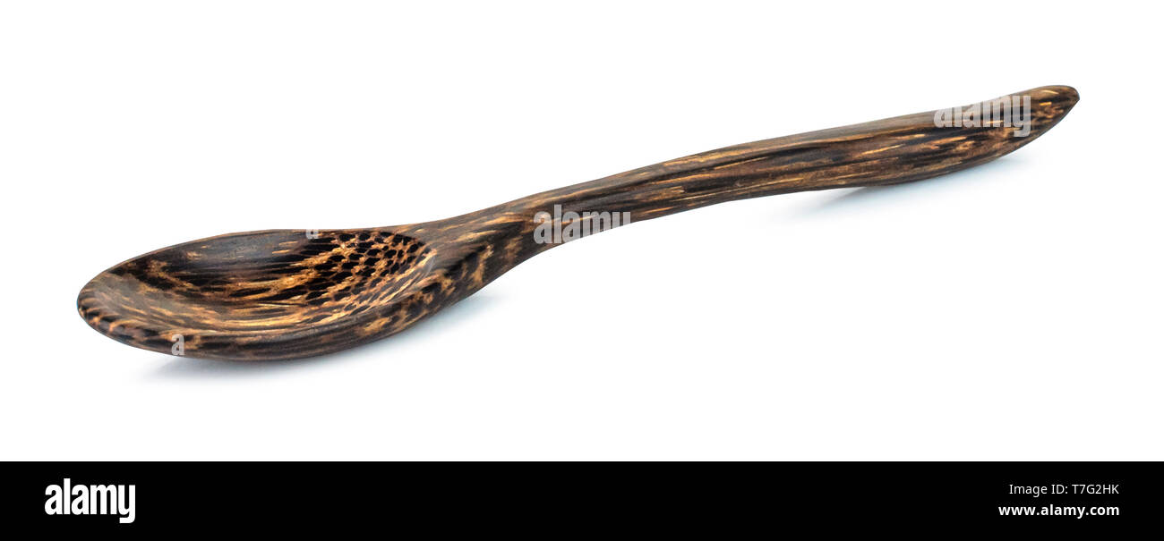 A wooden small spoon isolated on white background with clipping path ...