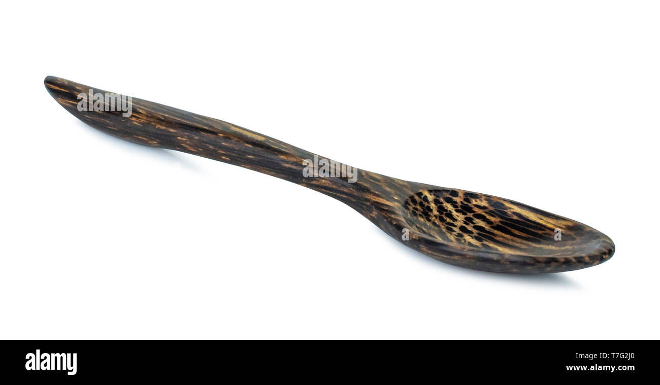 A wooden small spoon isolated on white background with clipping path ...