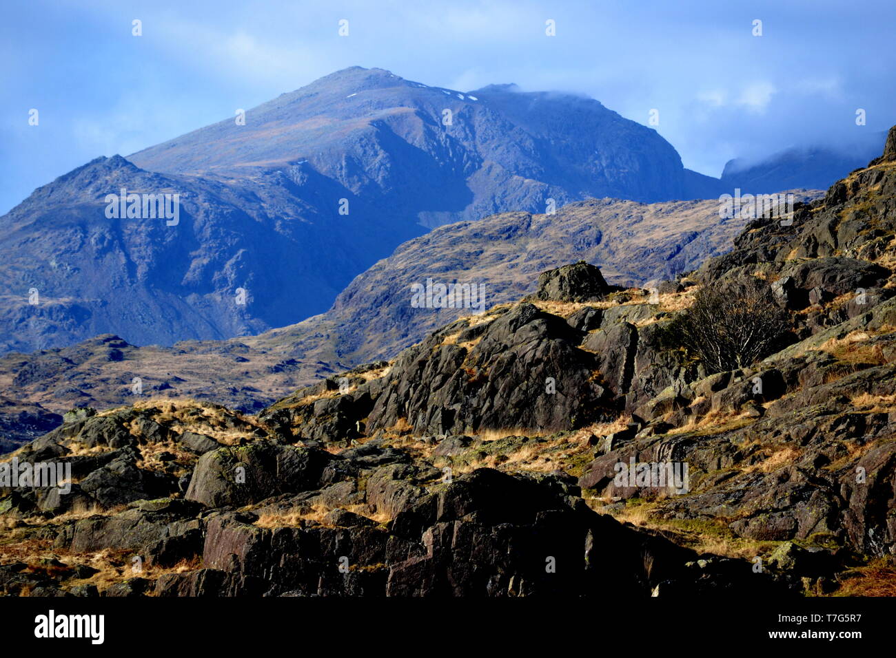 Looking towards Scafell Pike, the highest mountain in England, from the Duddon valley in the Lake District, North West England, United Kingdom Stock Photo