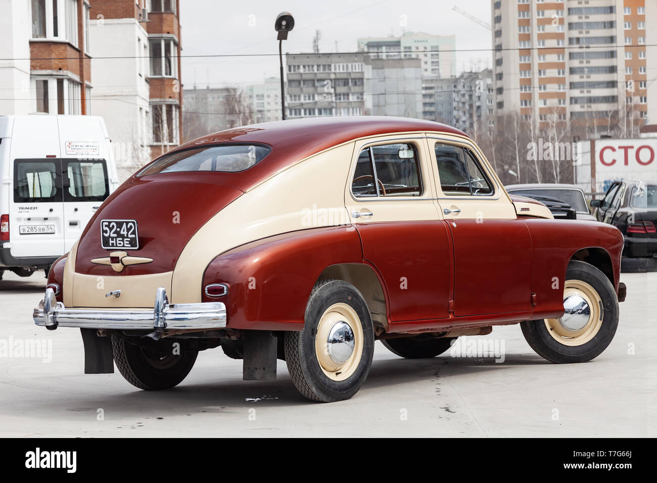 Russian Car Rear Engine Novosibirsk, Russia - 05.01.2019: Rear view of the double colored brown ...