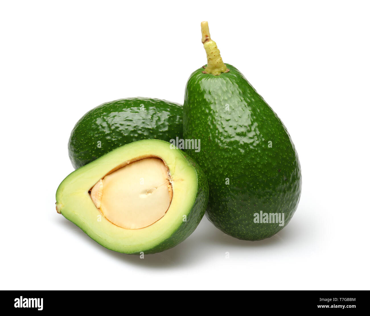 Whole and half green avocados isolated on white background Stock Photo ...