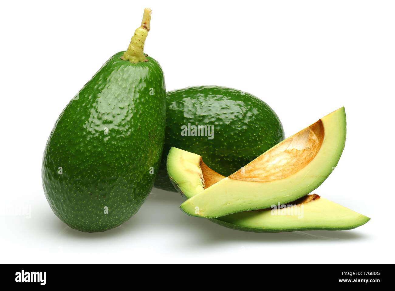 Whole and sliced green avocados isolated on white background Stock ...