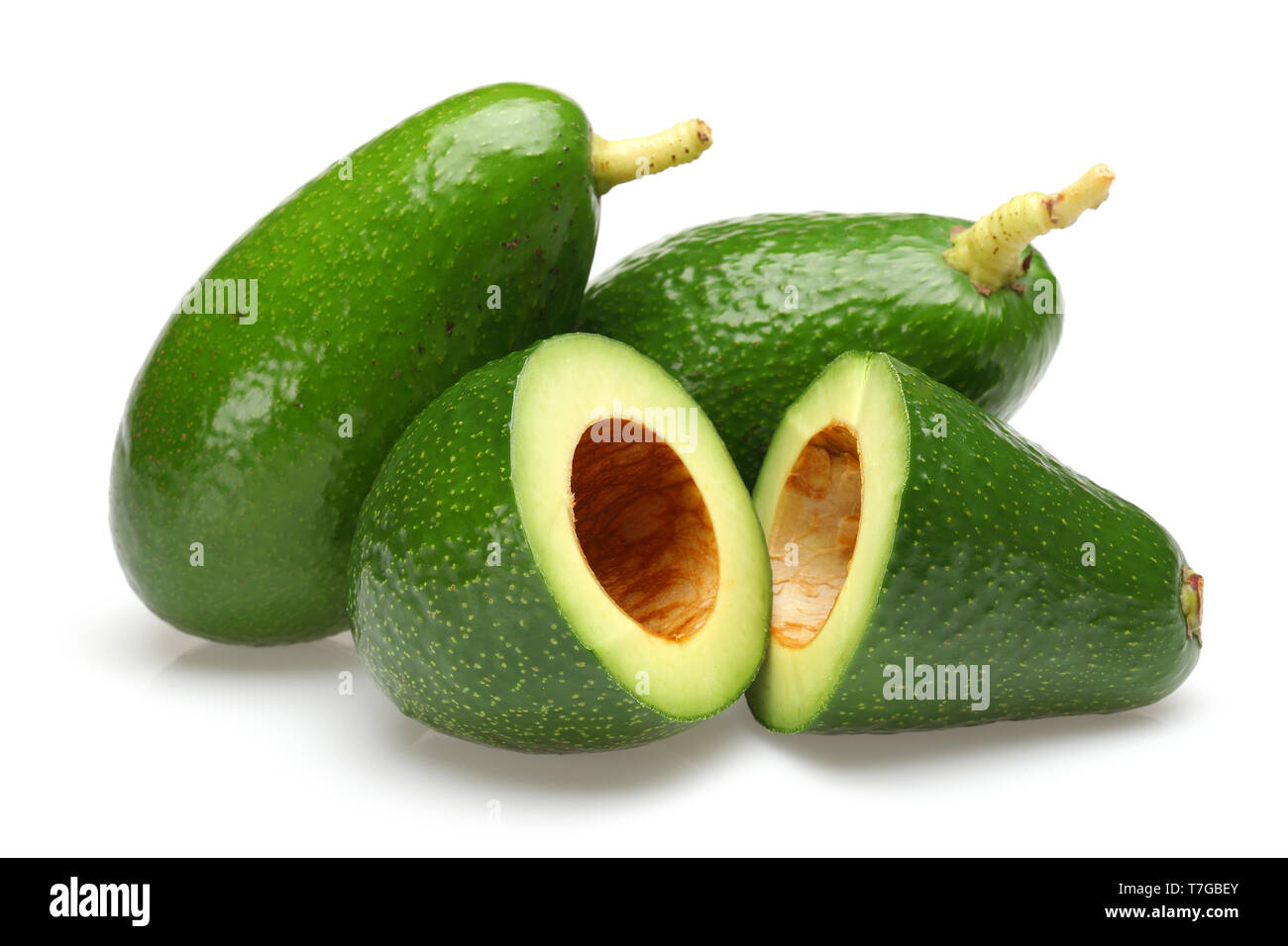 Whole and half green avocados isolated on white background Stock Photo ...