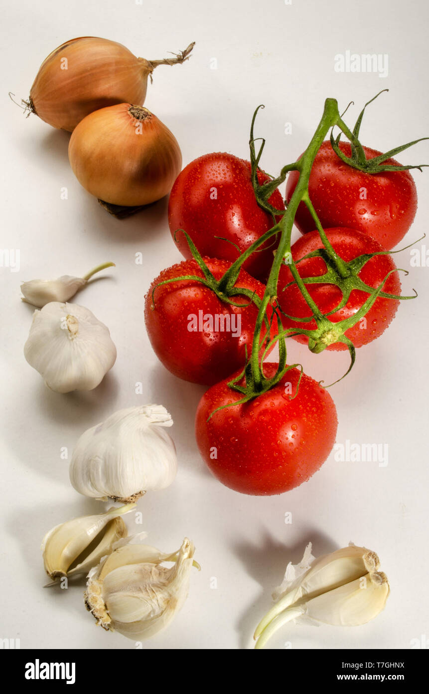 ingredients to make a delicious organic tomato sauce Stock Photo
