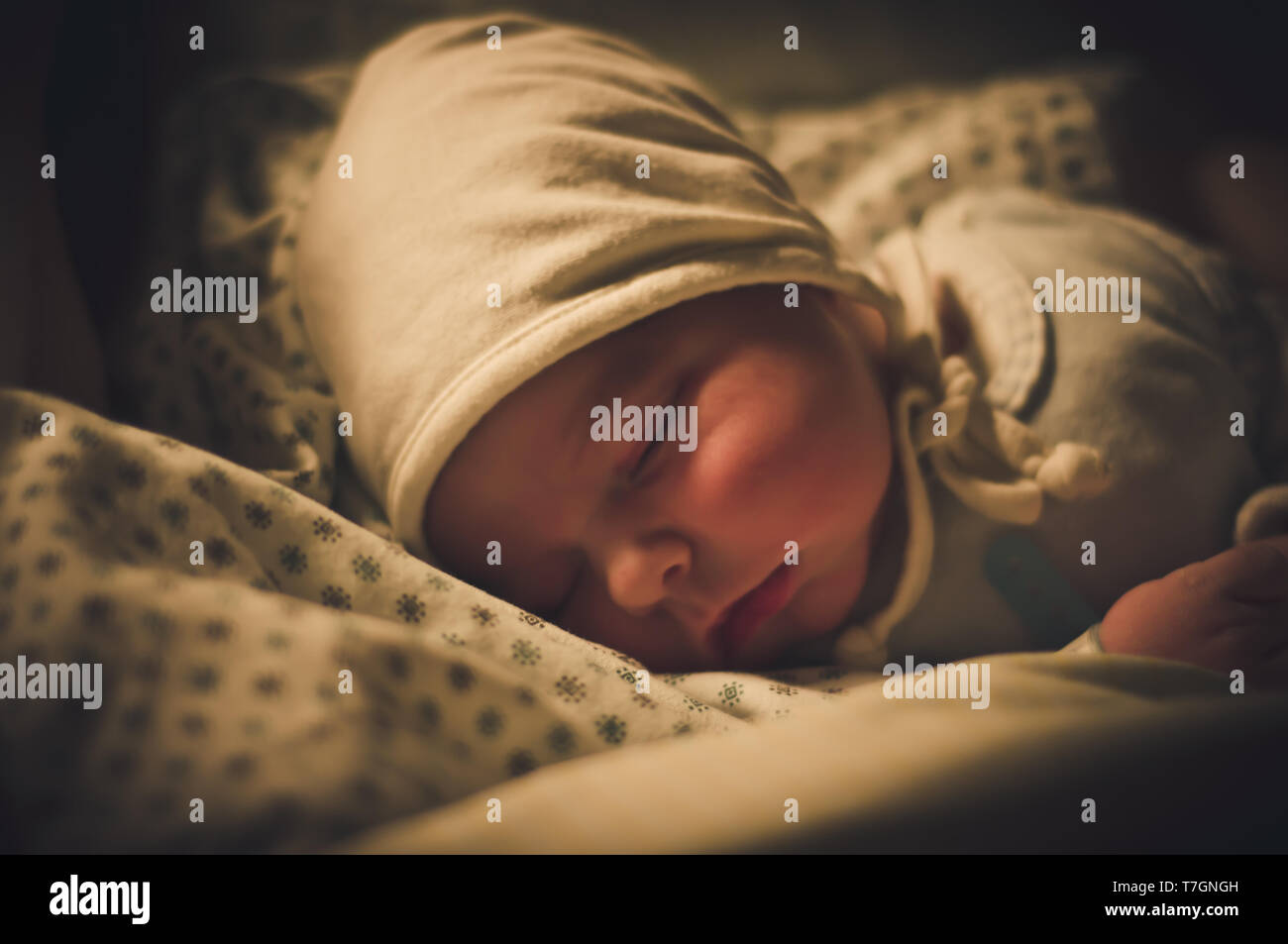 Newborn baby boy sleeping, after childbirth. Photo taken a few hours