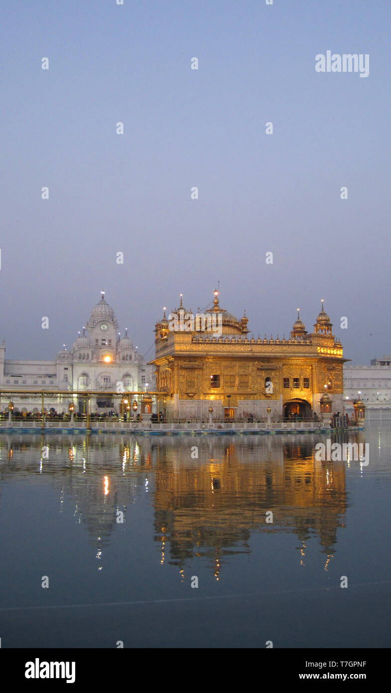 Golden Palace (or Darbar Sahib or  Sri Harmandir Sahib) in the city Amritsar, Punjab, India. The holiest Gurdwara and the most important pilgrimage si Stock Photo