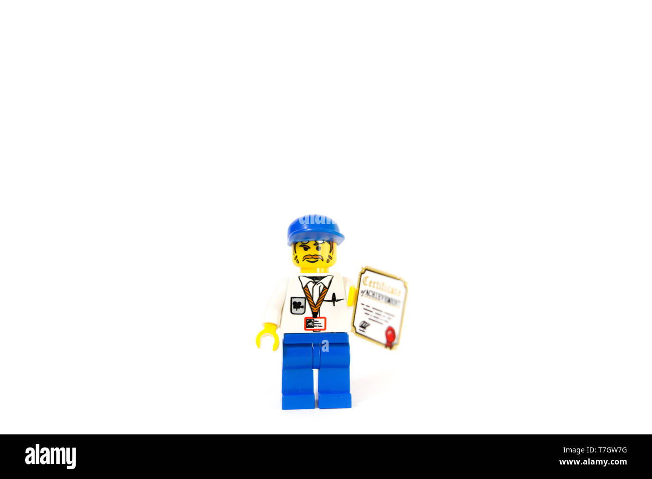 A Lego Film Maker Holding A Certificate Of Achievement This Cameraman Progressing His Career Stock Photo Alamy