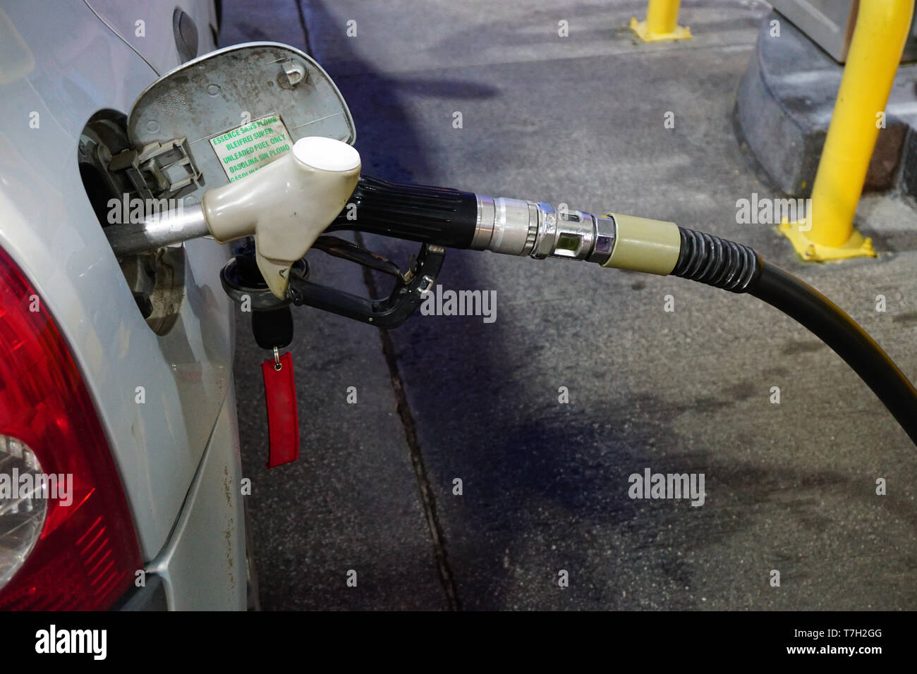 Filling car at the gas station the gas pump Stock Photo - Alamy