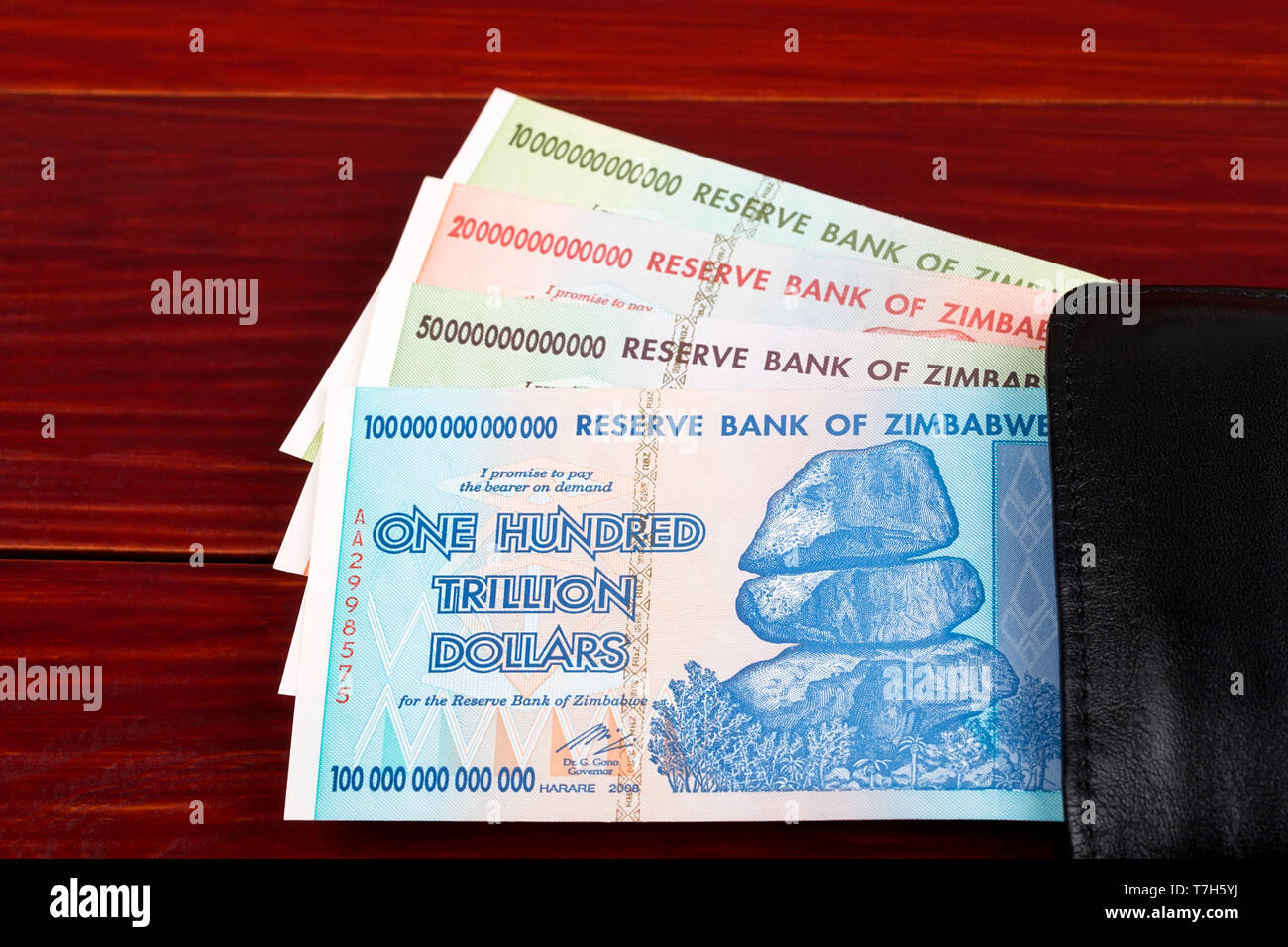 Trillion dollars from Zimbabwe, in the black wallet Stock Photo