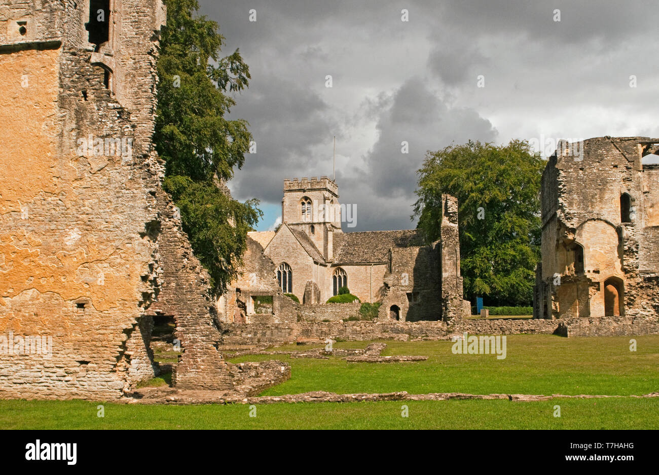 Minster Lovell Hall ruins and Church Cotswolds Oxfordshire. So named after St Kenelm's Minster, the village church. Stock Photo