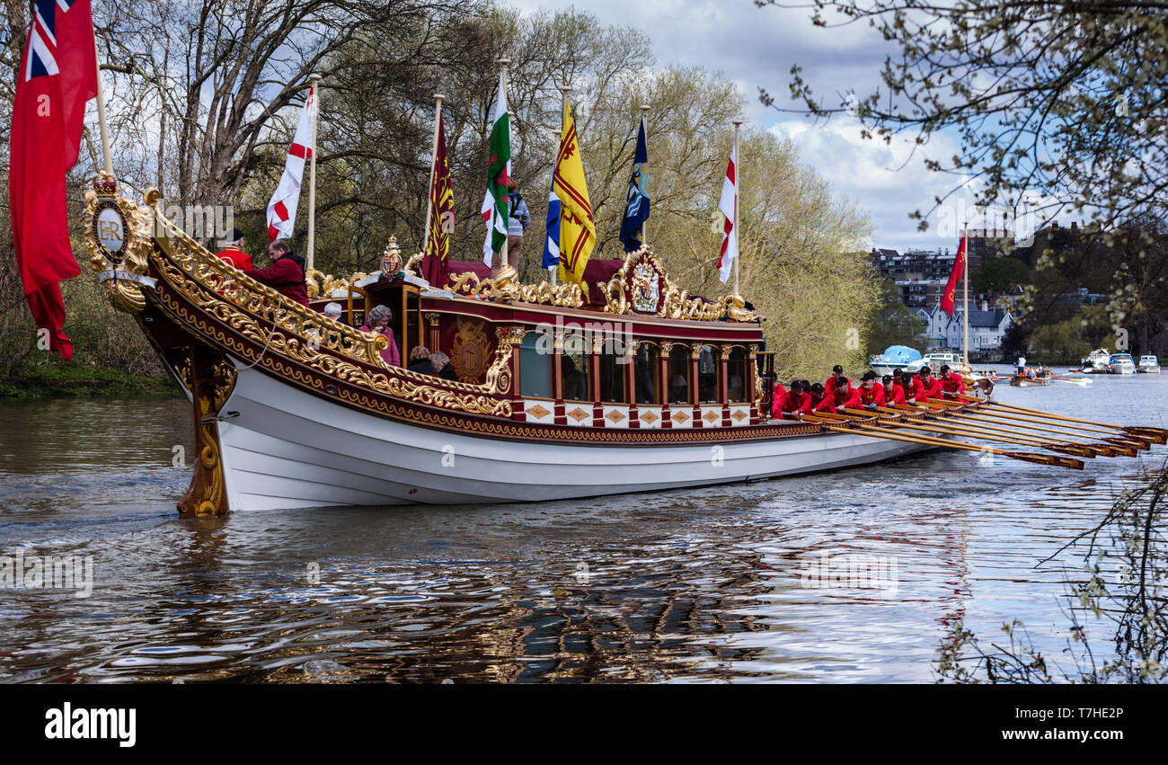 Royal Barge, Gloriana on journey along the River Thames in Surrey, west