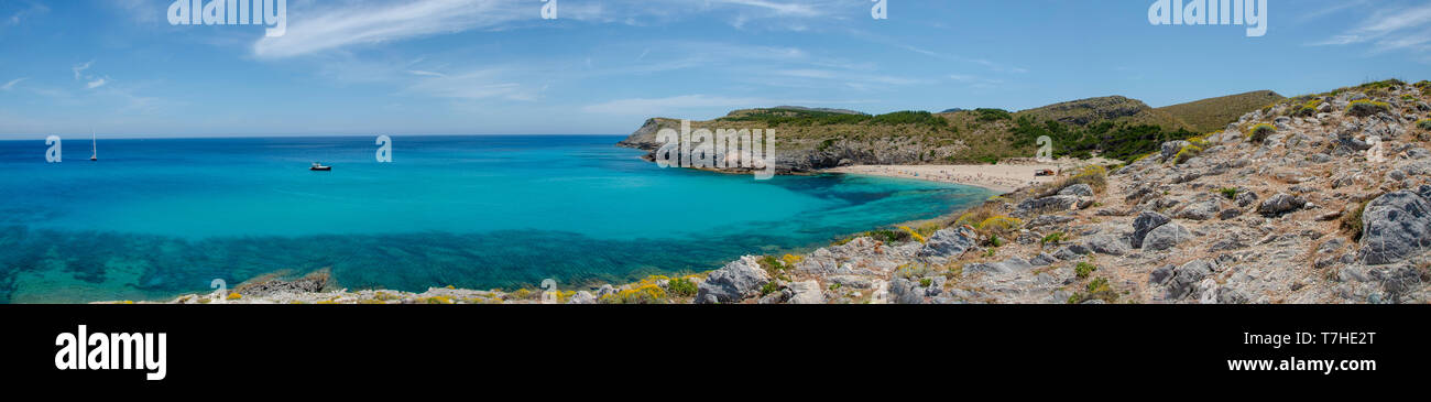 Panoramic view of Cala Torta beach on the island of Majorca, Spain. Europe. Balearic Islands. Sailboat moored in calm and crystal clear waters Stock Photo