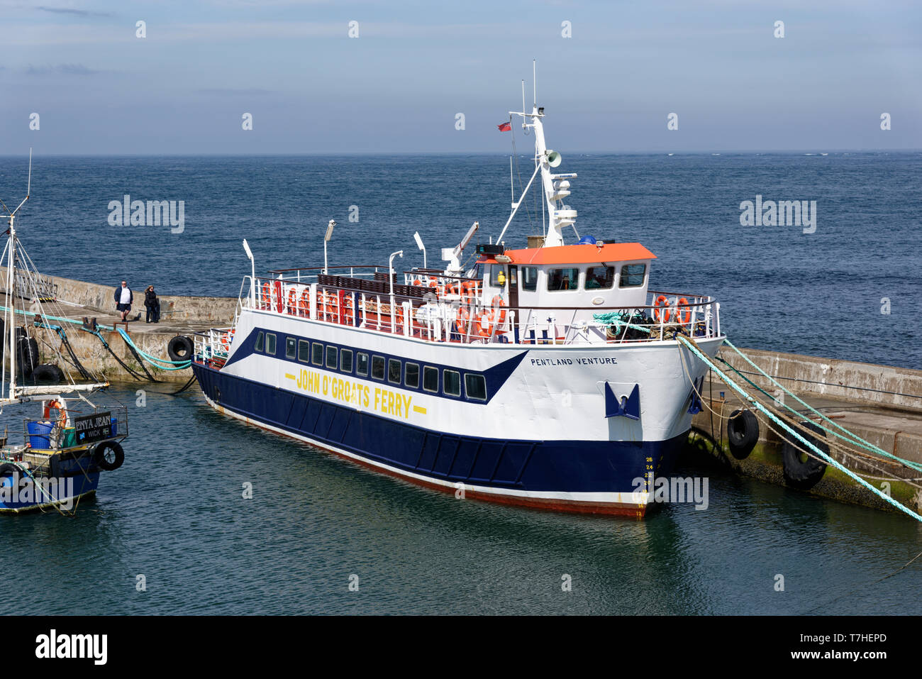 The John o' Groats Ferry, Pentland Venture moored in the small harbour at this most Northern part of the Scottish mainland. Stock Photo