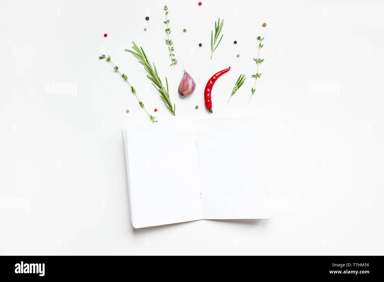 https://c8.alamy.com/comp/T7HM56/flat-lay-overhead-view-blank-notebook-pages-mockup-text-space-invitation-card-on-white-background-with-greens-herbs-and-spices-menu-or-recipe-book-or-T7HM56.jpg