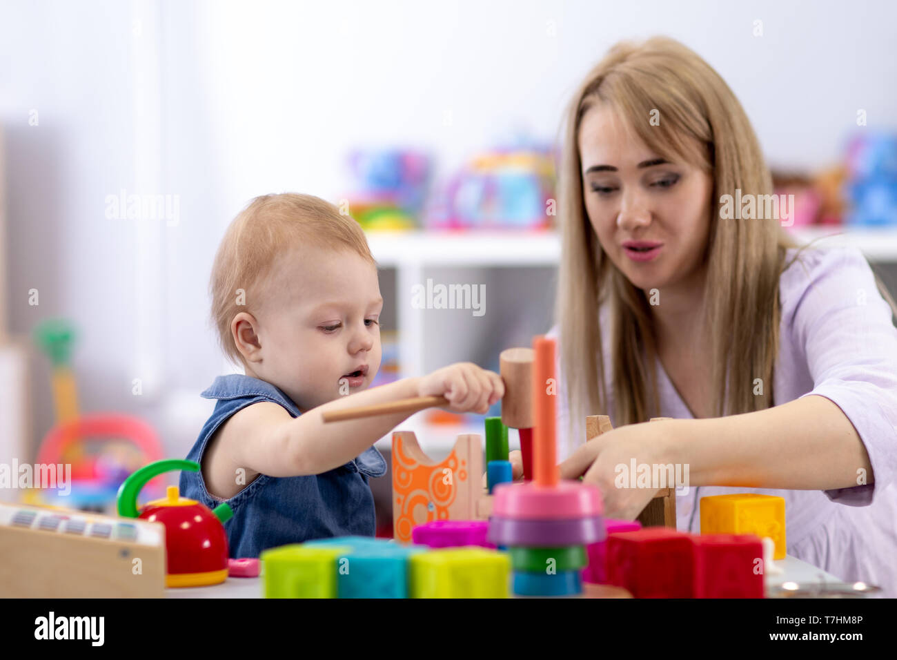 preschool-students-teacher-table-hi-res-stock-photography-and-images