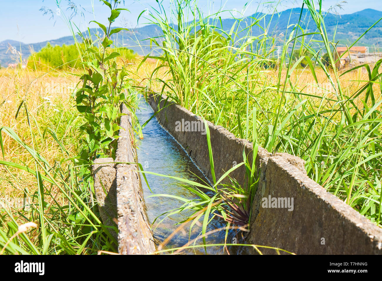 Italia irrigation channel with old precast concrete elements Stock