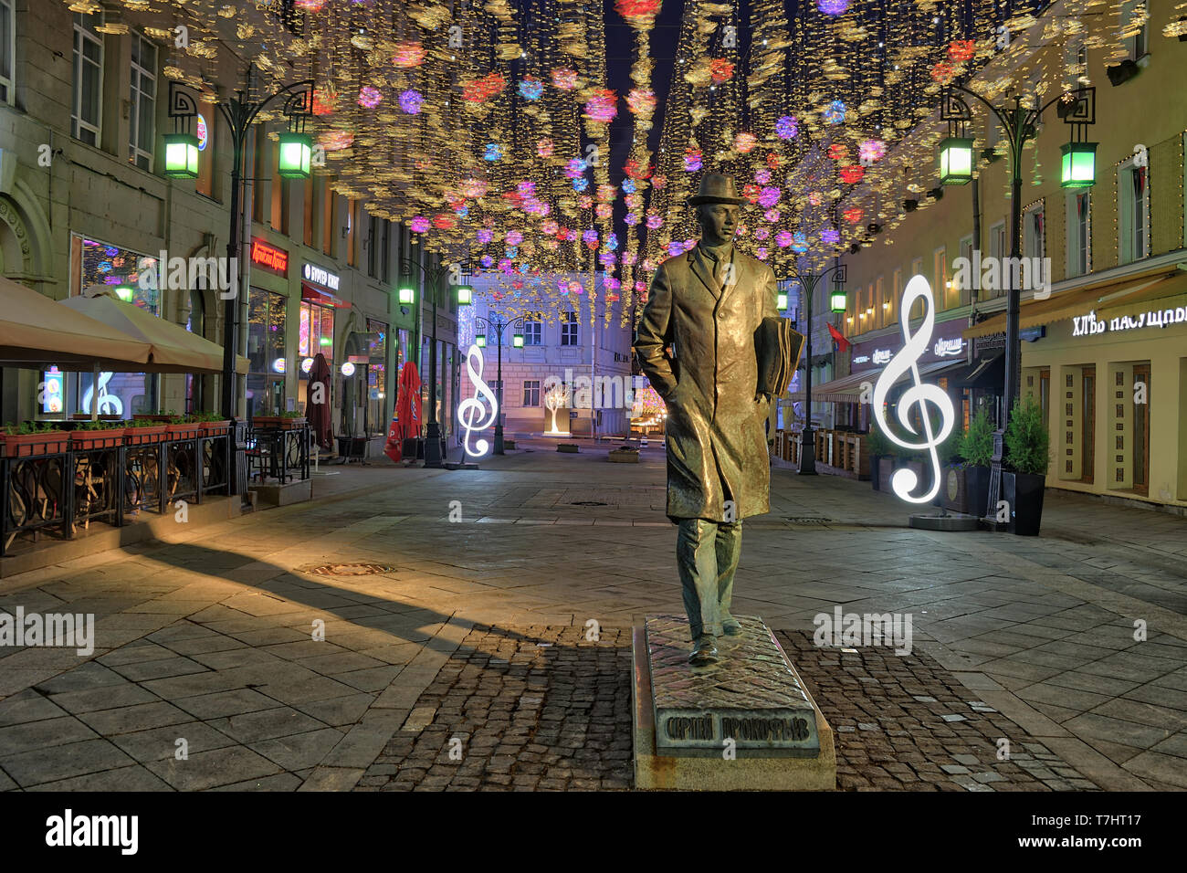 = Prokofiev Monument at Kamergersky Lane at Spring Night =  The bronze monument to the remarkable Russian composer Sergei Sergeyevich Prokofiev (27 Ap Stock Photo