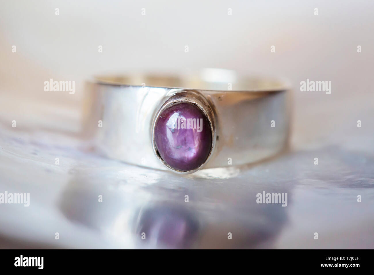 Beautiful silver ring with natural ruby star gemstone Stock Photo